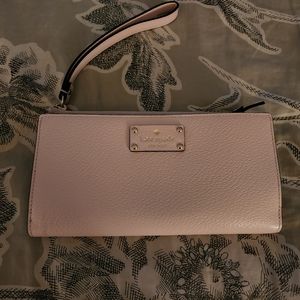 Pink Kate Spade wrist large with zipper front